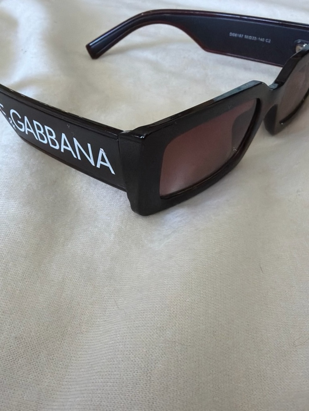 Dolce & Gabbana Black Sunglasses with Brown-Tinted Lenses